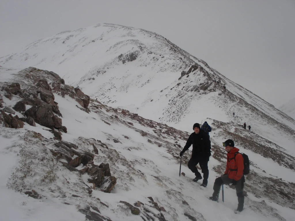 uphill with ice axe and crampons