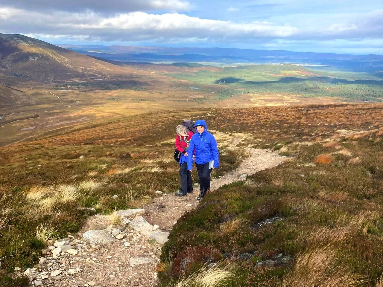 two people on a mountain path