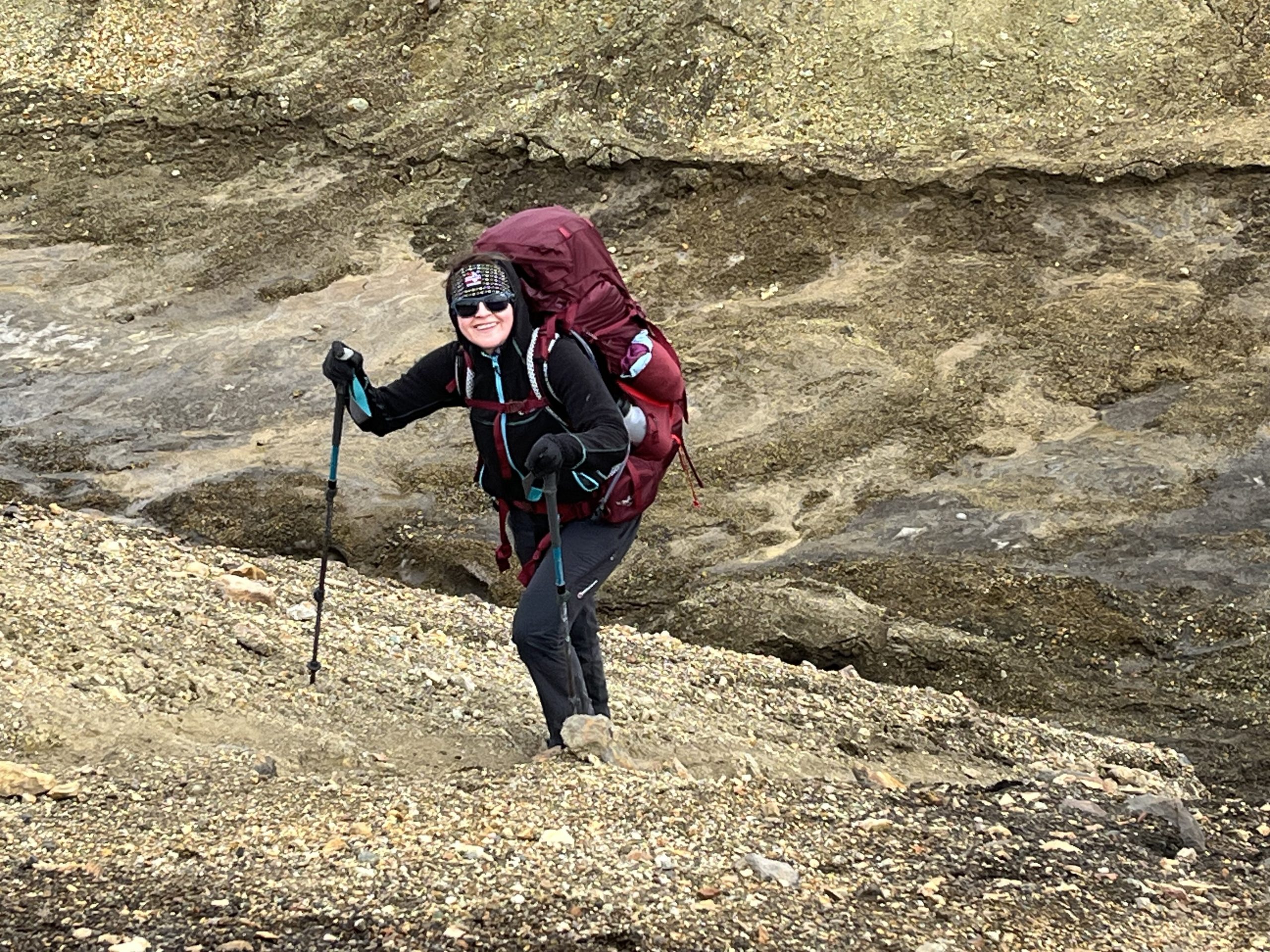 Lake District mountain skills course: small group walking on high ground in the fells