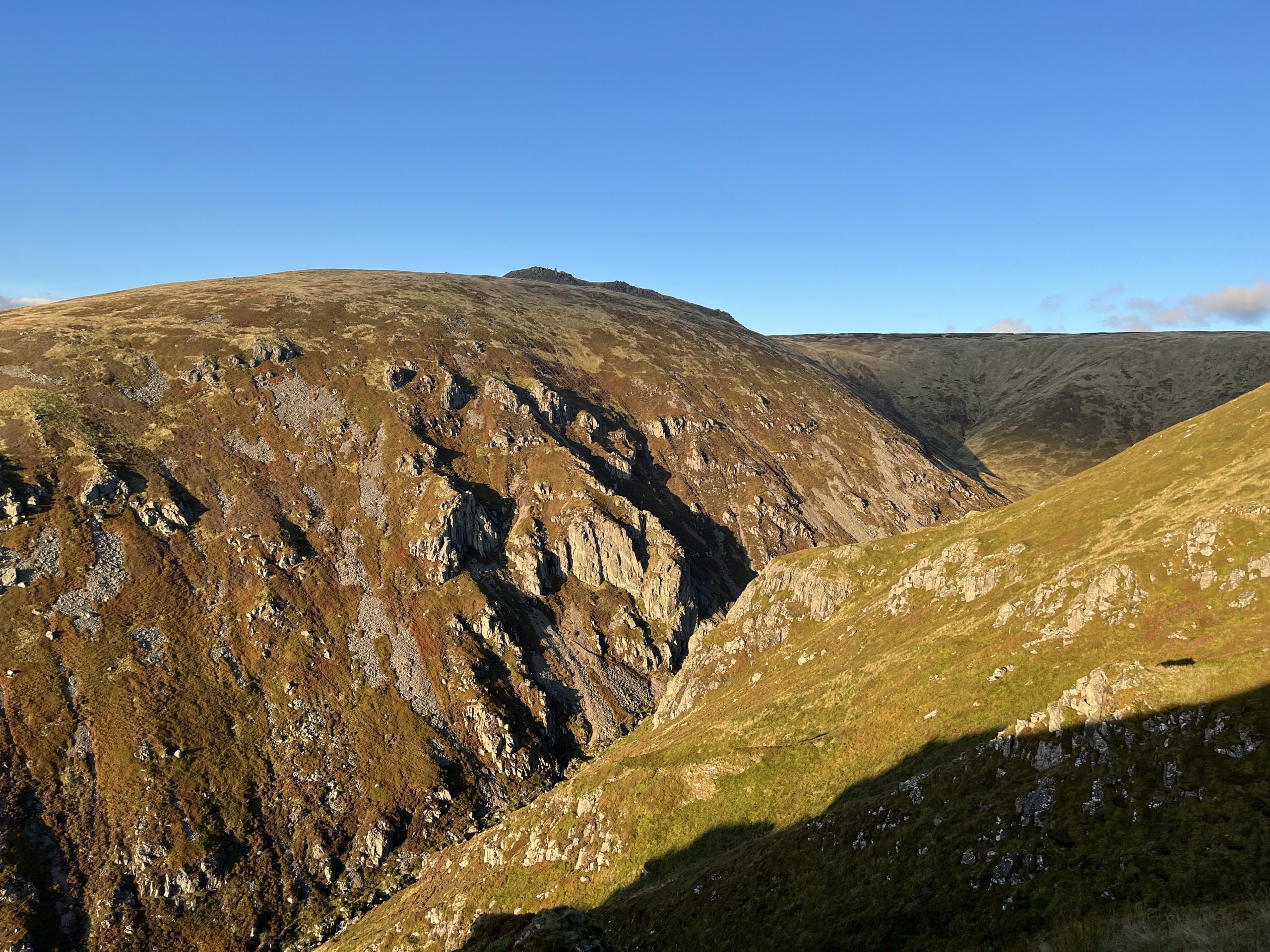 Cairngorms mountain skills course: small group walking on high mountain paths