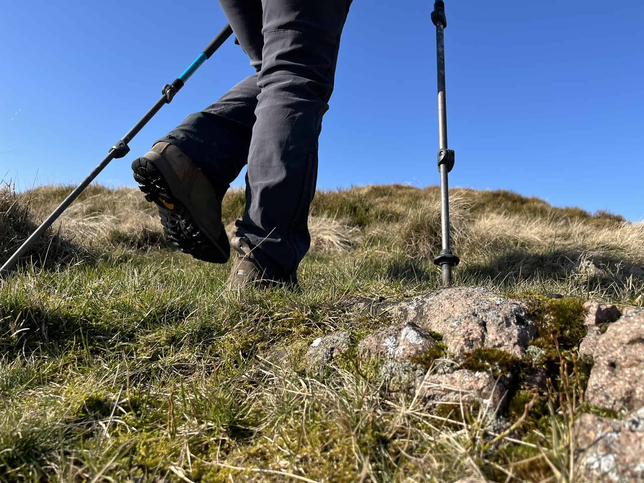 Backpacking kit and shelter system prepared for a mountain overnight trip