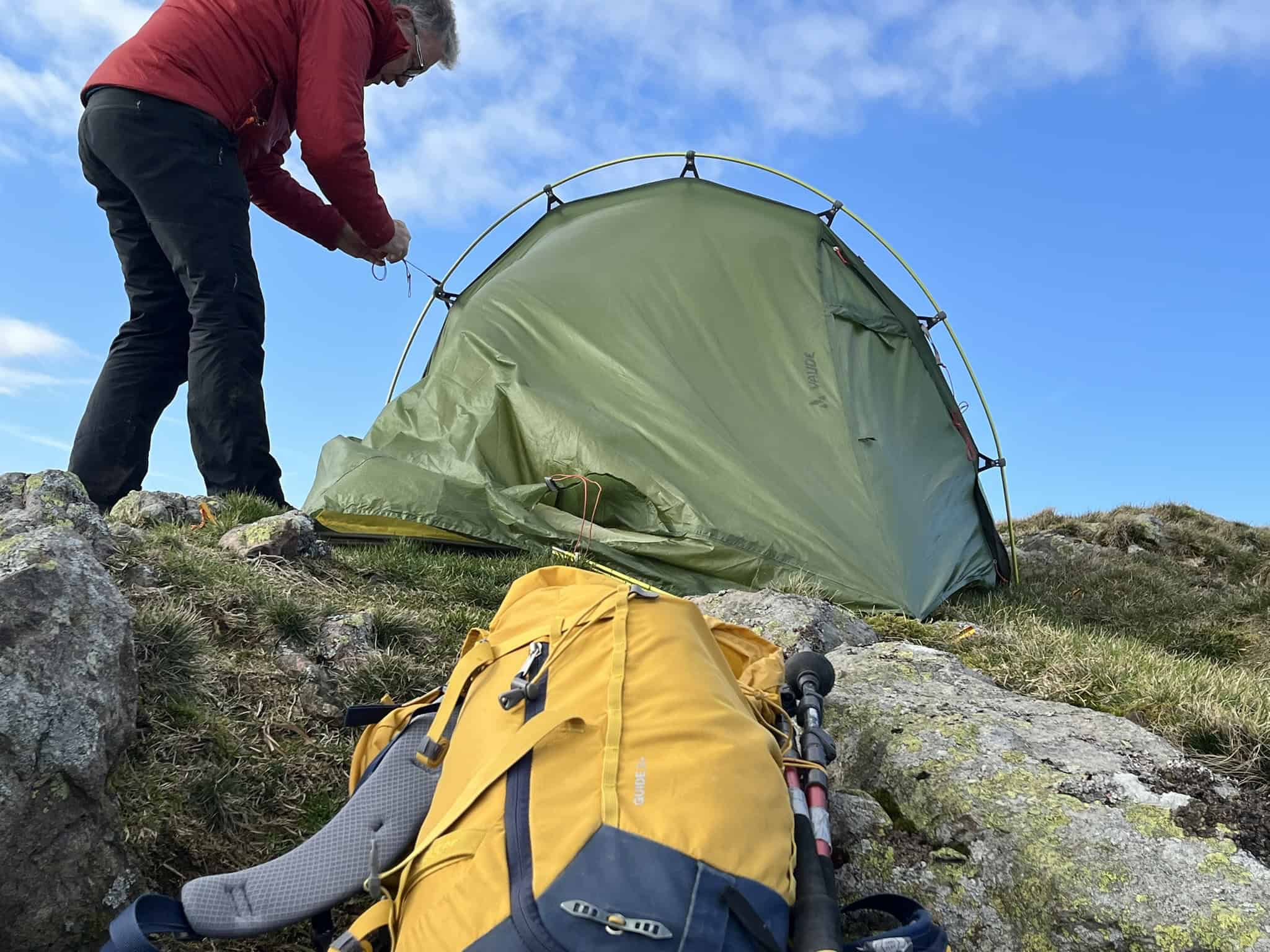 Wild camping in the UK with a lightweight mountain backpacking tent pitched high in the hills