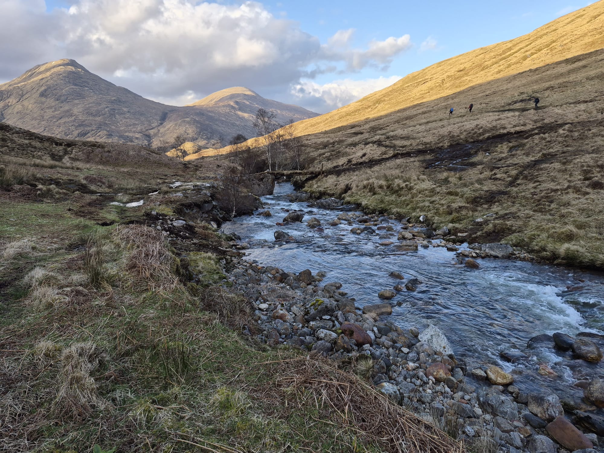 River flowing through a remote Knoydart glen surrounded by mountains