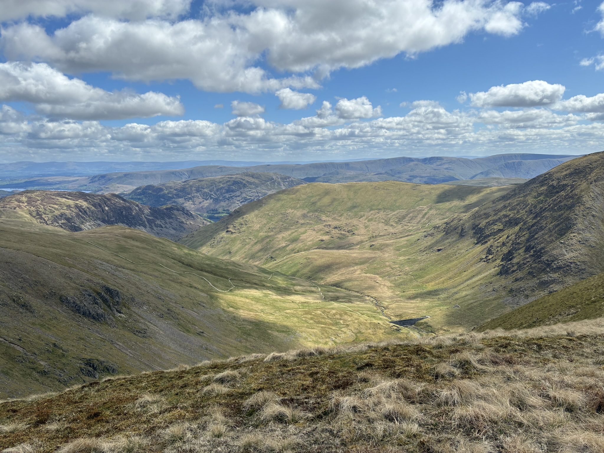 Wide valley views across the Lake District fells on a guided mountain wild camp